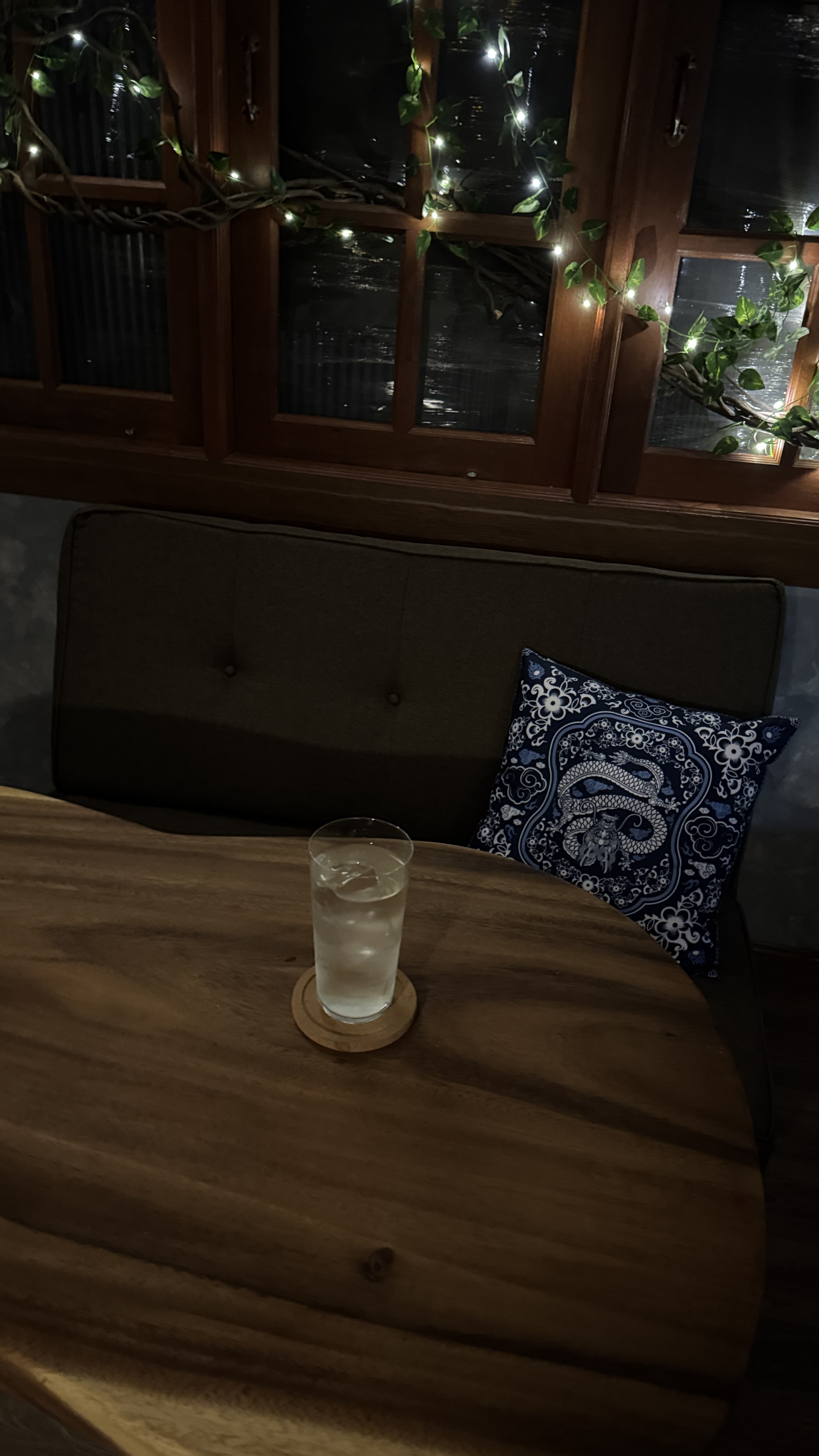 Non-alc Tequila & Tonic. Cozy sofa for 2-3 people.
